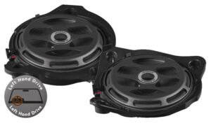 Pair of round black car speakers with mounting frames and upgrade badges (left and right units).